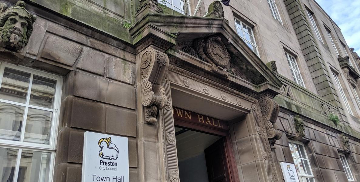 Town Hall entrance close up side view Town Hall entrance close up of sign and stonework from the side