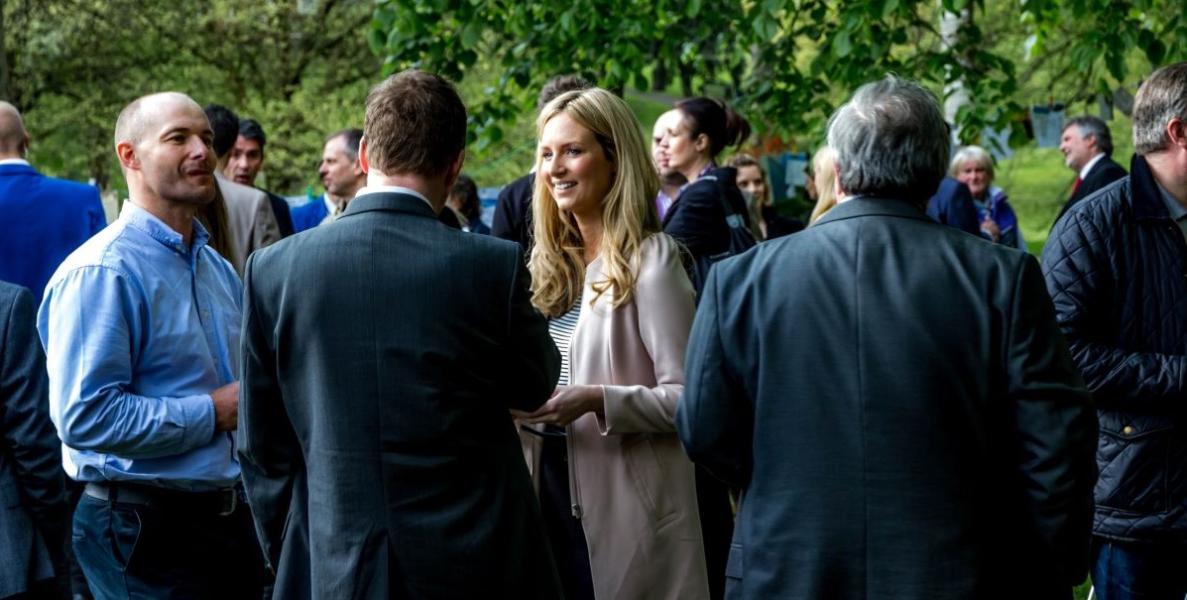Business people networking outdoors Business people networking outdoors